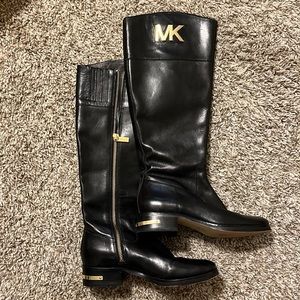 Michael Kors black riding boot with gold MK emblem. **these are a womens size 4